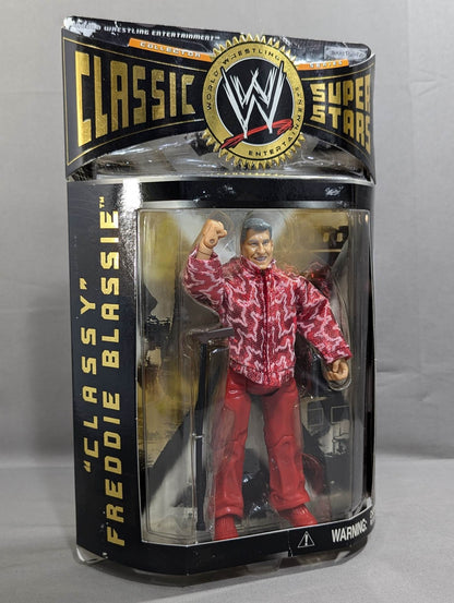 Fred Blassie  (red jacket)