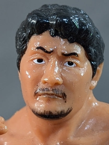 Akira Maeda  (red wristband)